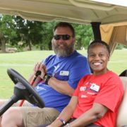 Veterans in a golf cart