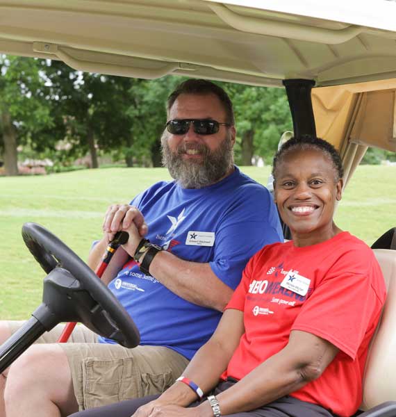 Veterans in a golf cart