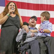 Wounded Veteran with family speaking